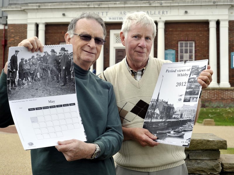 Museum curators of photography Roger Pickles and Chris Roberts with the 2012 calenders.