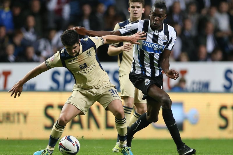 Alex Mowatt shields the ball from Newcastle United's Sammy Ameobi during the League Cup clash at St James's Park in September 2013.