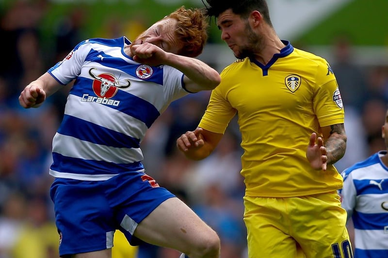 Alex Mowatt risesd high with Reading's Stephen Quinn during the Championship clash at the Madejski Stadium in August 2015.