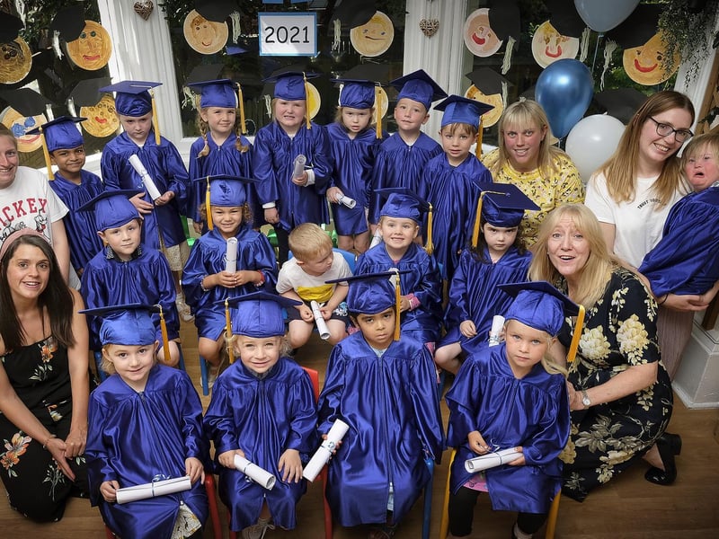 Staff celebrate with the Nursery Graduates.