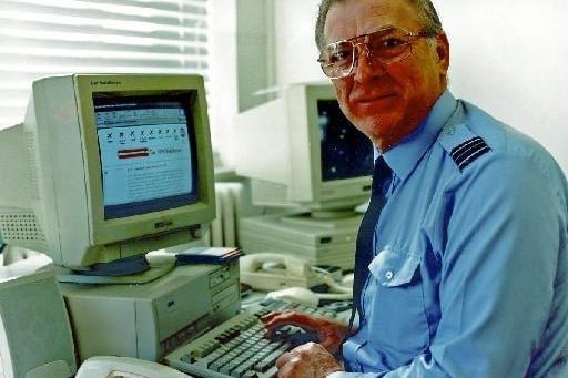 Ex RAF Squadron Leader Tony Cunnane of Wakefield West Yorkshire. Pictured at his desk on his final working day April 2001