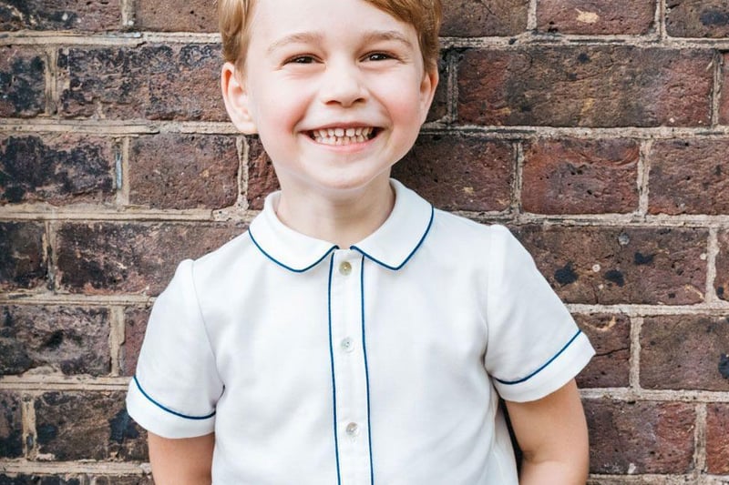 Prince George was photographed in the garden of Clarence House to mark his fifth birthday in 2018.
The picture, showing the prince grinning at something - or someone - off camera, was taken after the christening of Prince Louis.