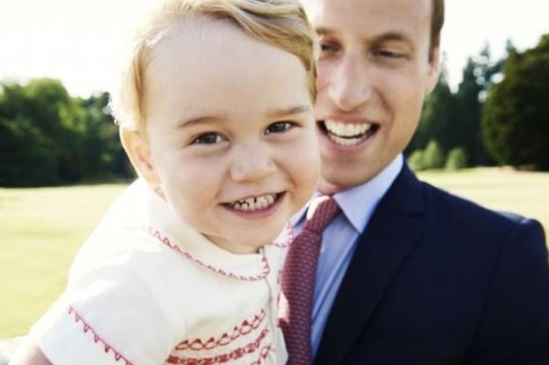 The picture to mark Prince George's second birthday was taken by fashion photographer Mario Testino, and shows the then toddler smiling in the arms of his father, Prince William.
The picture was taken after Princess Charlotte's christening on 5 July.
It was taken in the gardens at Sandringham House, on the Queen's Norfolk estate, and was part of the series of official photographs taken by Testino following the princess's christening.