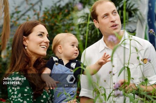 This photo dated Wednesday July 2, 2014, was taken to mark Prince George's first birthday and shows the Duke and Duchess of Cambridge and the Prince during a visit to the Sensational Butterflies exhibition at the Natural History Museum, London.