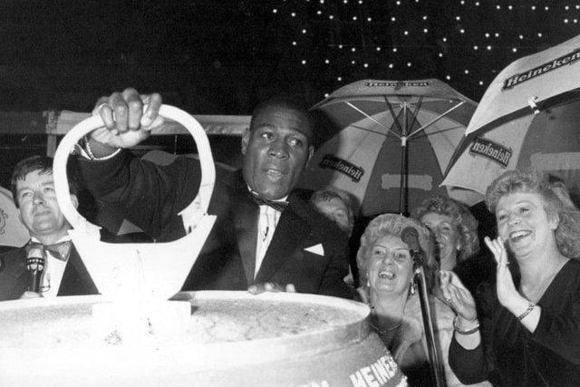 Former world heavyweight boxing champion Frank Bruno puts the lights on in 1989