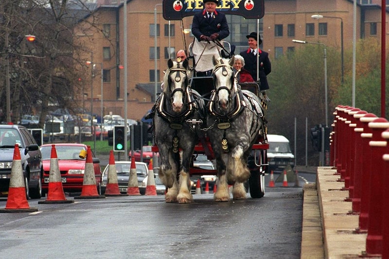 The Tetley dray horses Prince (left) and Charles make their way over the newly- widened Crown Point Bridge in December 1995 which was officially opened by Coun Linda Middleton.