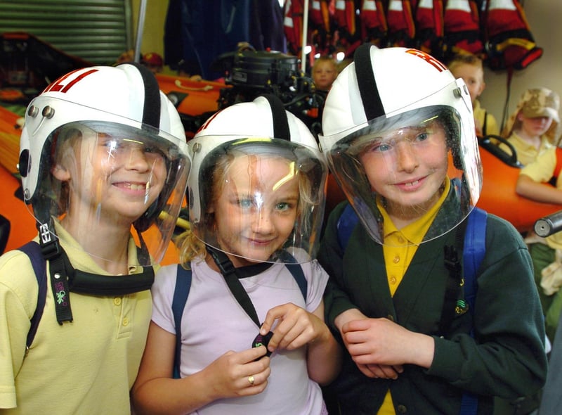 Daniel Field, Katie Lawson and Marian Terry of Lindhead School visit the lifeboat station.