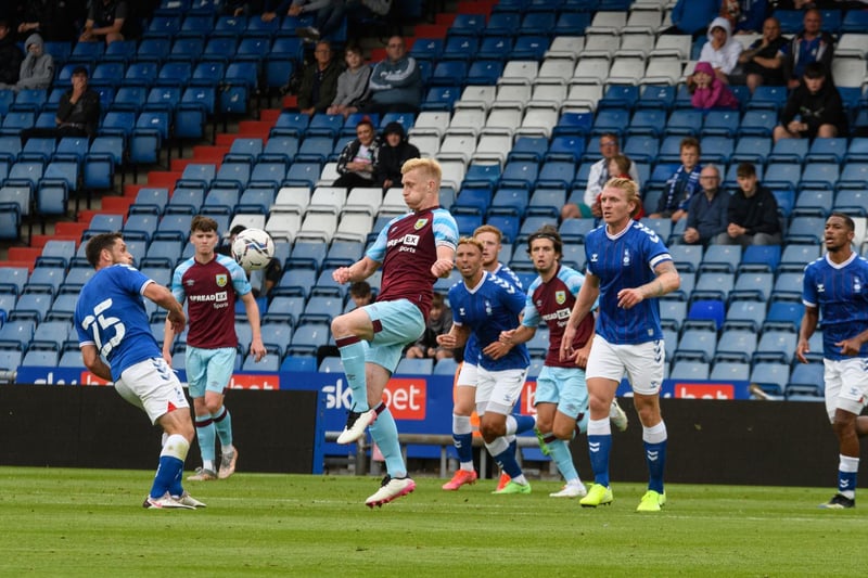 Ben Mee wins a tussle for the ball.