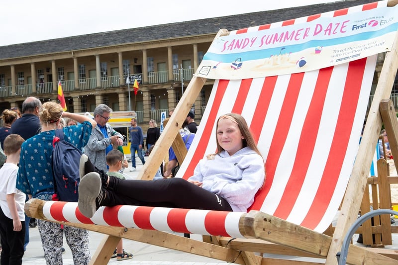 Isabelle Hough tries out the giant deckchair.