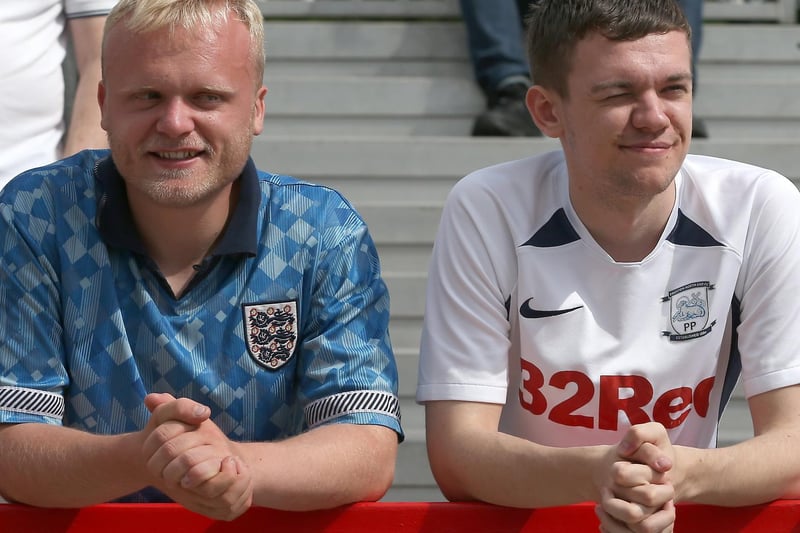 England and PNE shirts on show in the away end at Accrington