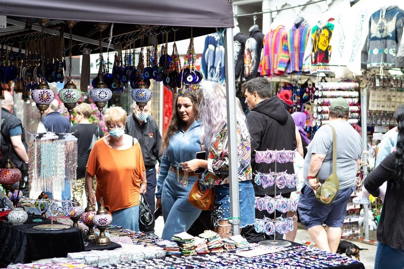 Shoppers browse at some of the stalls.