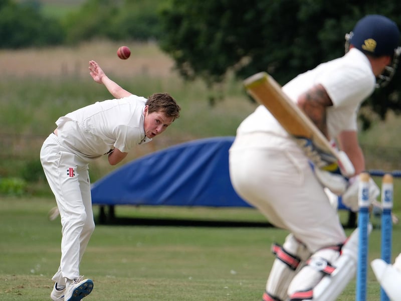 Tom Hendry steams in to bowl

Photos by Richard Ponter