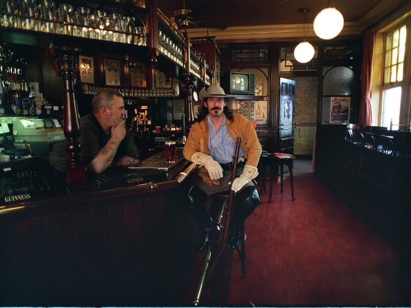 Buffalo Bill (Adam Desforges) enjoys a pint at the Cardigan Arms to the surprise of landlord Barrie Edmands. The stunt was to publicise the Buffalo Bill Wild West exhibition at the Royal Armouries.