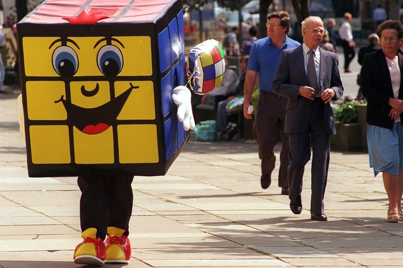 There were puzzled expressions in Victoria Gardens. The Rubik's cube people were in Leeds with the three dimensional problem and this giant version, complete with legs , was used to promote it.