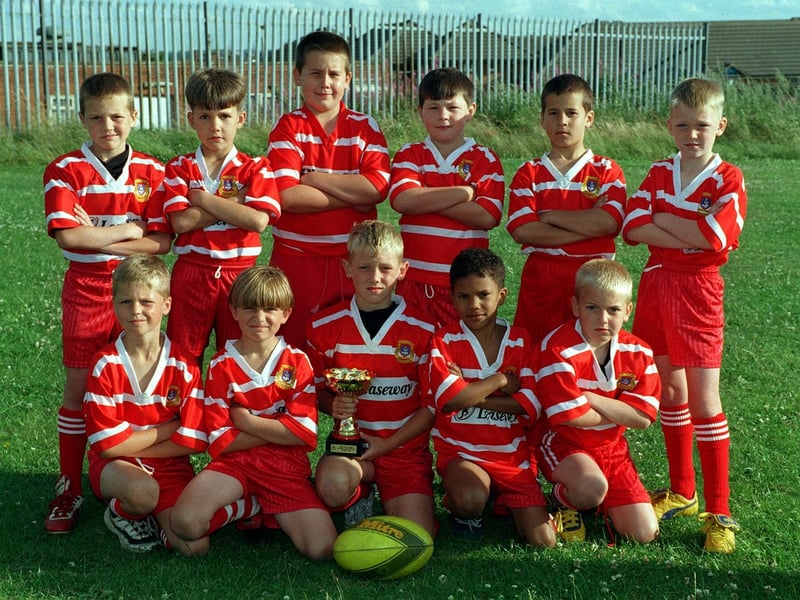 East Leeds U-8s RL team won the Leeds Youth Games. Back: Brad Langton, Tom Morris, Brandon Hannon, Michael Downey, Jake Normington, Luke Keeligan. Front: Scott Coates, Kingsley Wetherald, Billy Kirby, Nathan West, Aaron Manning.