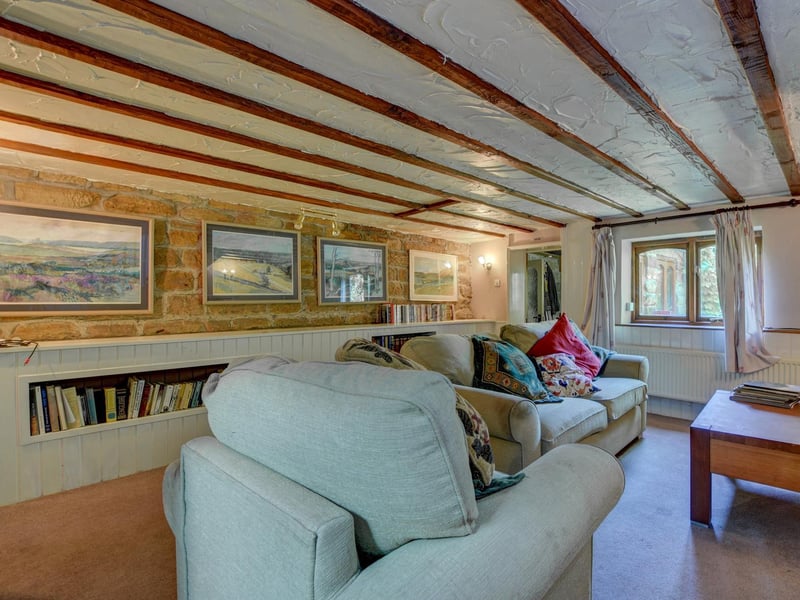A sitting room offers plenty of space to relax