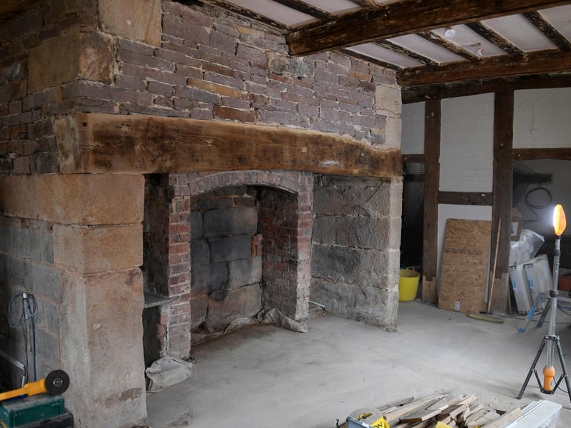 All the wooden beams are original, like this one above the fireplace