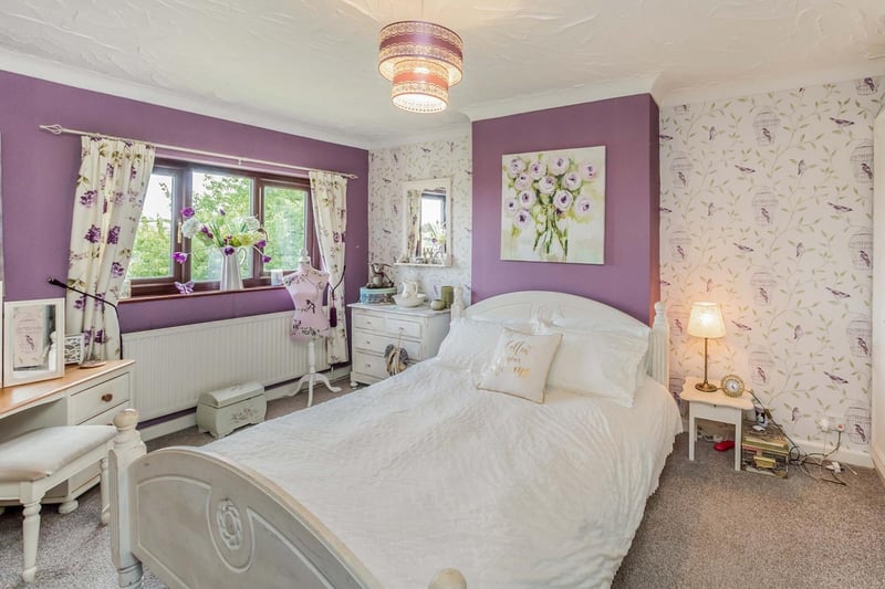 A pretty bedroom within the property