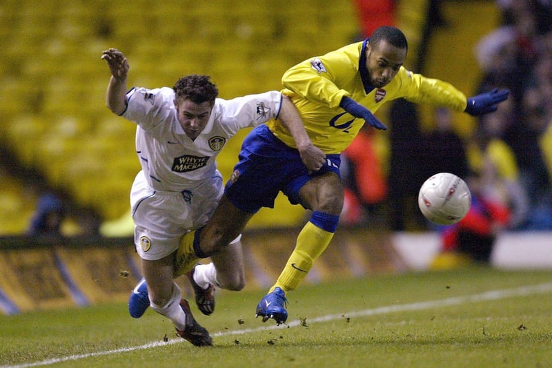Frazer Richardson and Arsenal striker Thierry Henry battle for the ball during the FA Cup third round clash at Elland Road in January 2004.