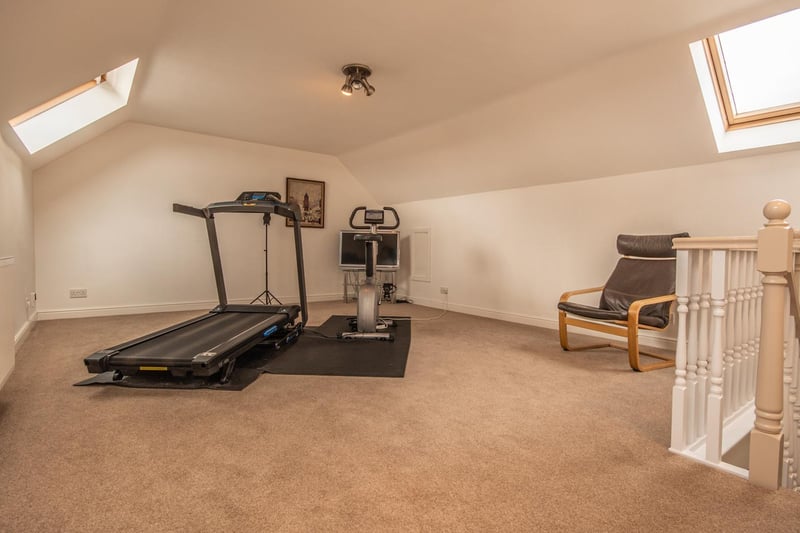 An upper floor room used currently as a gym
