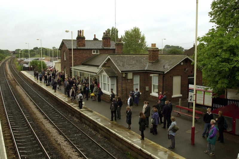 Passengers wait at the newly-refurbished Garforth railway station.