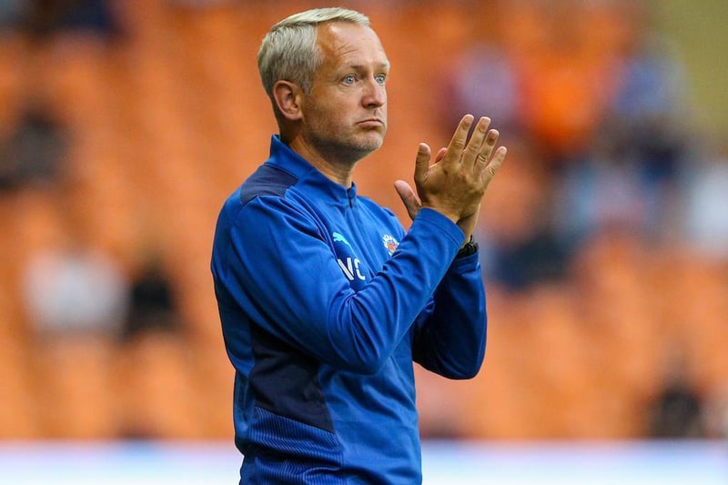 Blackpool manager Neil Critchley applauds a passage of play