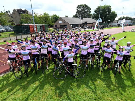 Kim Leadbeater pictured with the riders before they set off from the Princess Mary Stadium, Cleckheaton on the annual Jo Cox Way Bike Ride. Photo: Simon Hulme