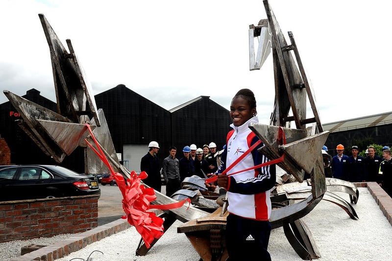 Olympic gold medalist and boxing champion, Nicola Adams, and some Sheffield Forgemasters apprentices unveil the newly structured Scorpion sculpture.

Photo: Scott Merrylees
