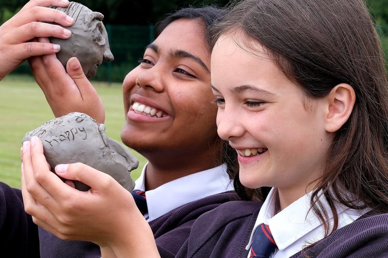 Curriculum enrichment day at St Augustine's - Neha and Rose with their clay creations..pic Richard Ponter