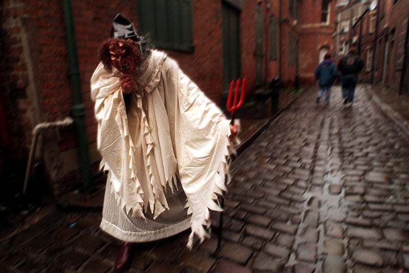 Ghostly goings on in Hirst's Yard.  The haunting image of Woodbine Lizzy, alias Michael Facer, one of the guides for the Leeds Ghosts Guided walk in October 1996.