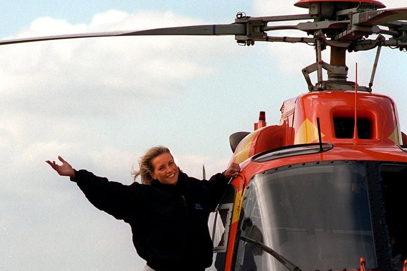 Big Breakfast weather girl Denise van Outen with the orange Big Breakfast helicopter touched down at Leeds Bradford Airport.