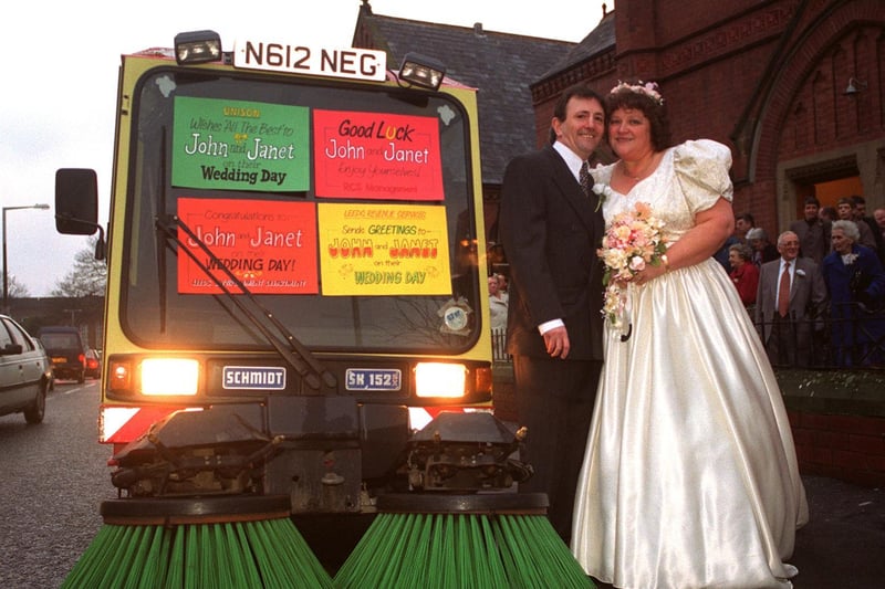 John Lince and his bride Janet Roberts pictured after their wedding at Crossgates Methodist Church with a street cleaner bearing good luck messages.