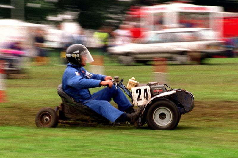 Members of the North West Lawn Mowers Association racing their machines at Temple Newsam.