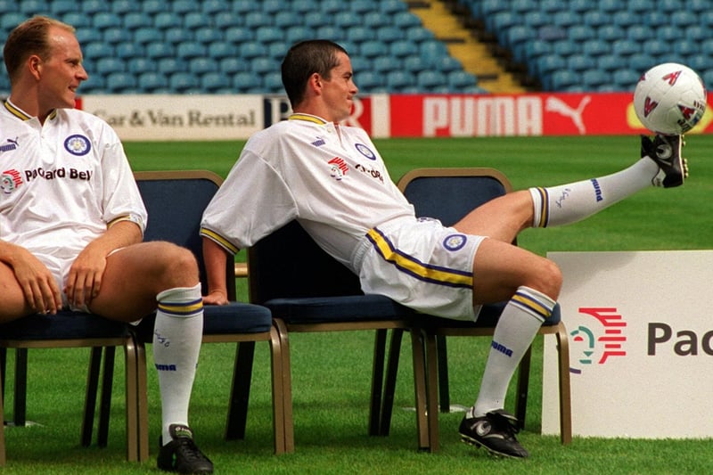 Robert Molenaar watches as Gary Kelly shows of his ball control skills before the start of the Leeds United photo-call.