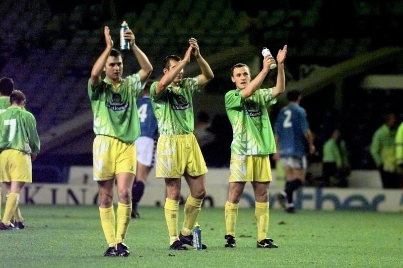Halifax Town players applaud their fans at the end of , the FA Cup first round tie at Maine Road back in 1998.