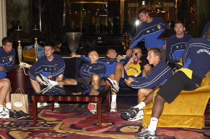 Leeds United players relax prior to a training session.