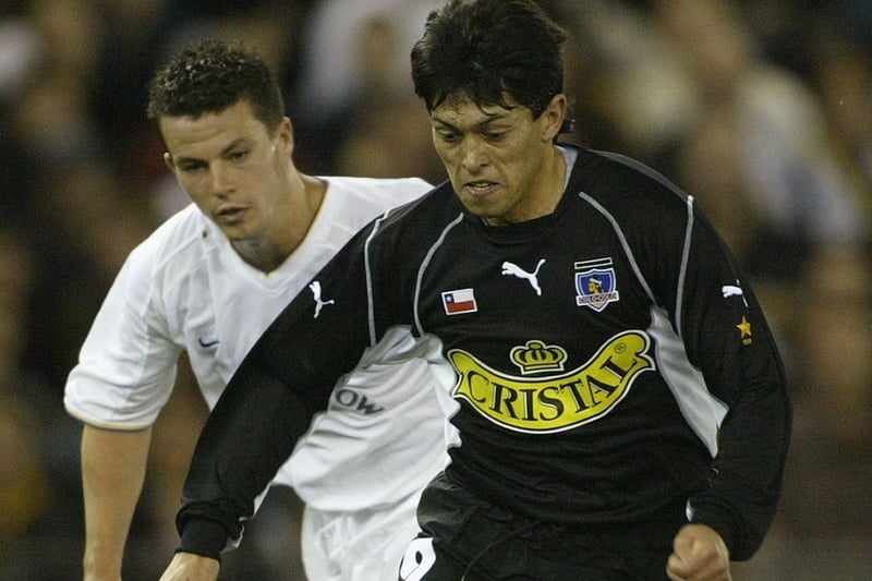 Ian Harte chases down Colo Colo's Marcos Millape.