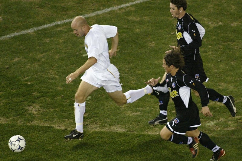 Danny Mills charges forward.