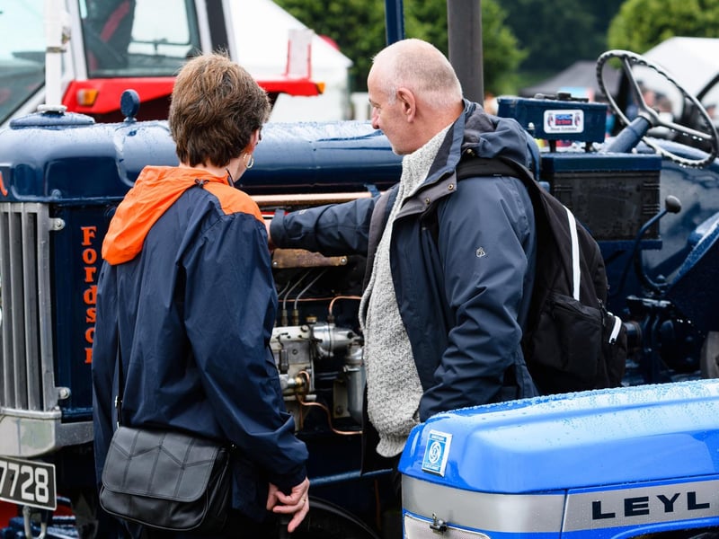 Visitors admire the tractors at the Royal Lancashire Agricultural Show 2021.