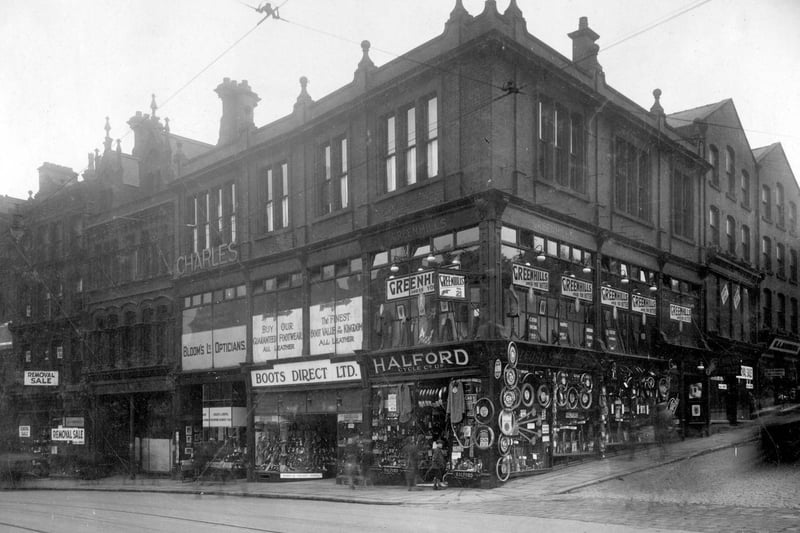 The junction of Mark Lane with New Briggate in August 1929. Pictured are Greenhills Tailors, Halford Cycle Co Ltd, Boots Direct Ltd, boot and shoe retailer and Blooms Opticians.