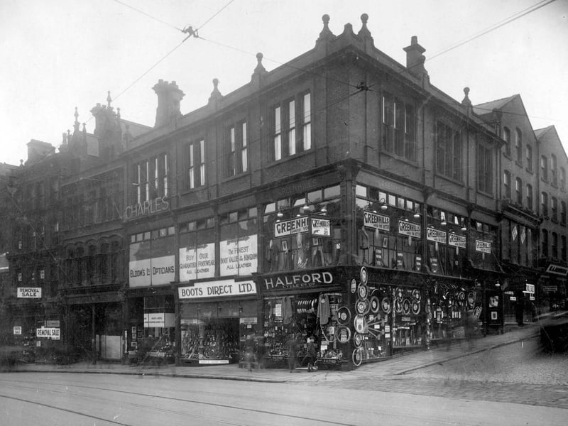 The junction of Mark Lane with New Briggate in August 1929. Pictured are Greenhills Tailors, Halford Cycle Co Ltd, Boots Direct Ltd, boot and shoe retailer and Blooms Opticians.