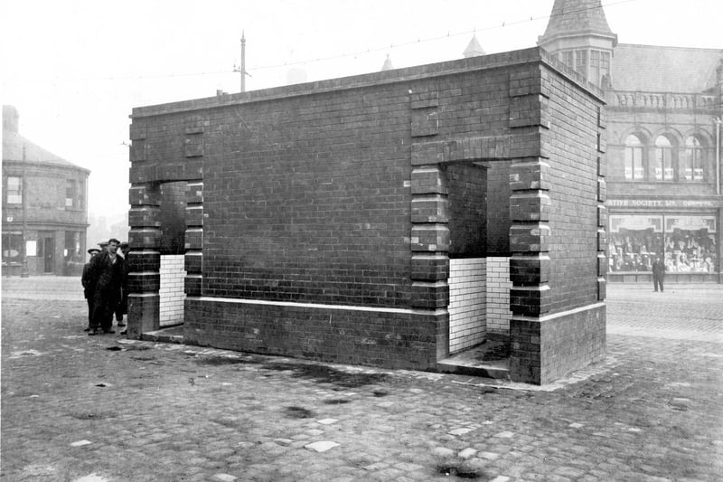 The public toilet on Church Street at Hunslet in April 1927. The Co-operative Society Ltd can be seen on right.