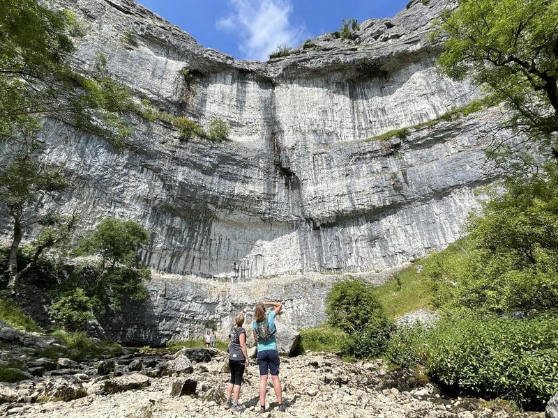 This natural beauty spot is a curved limestone formation standing 70 metres high above the Yorkshire Dales. Thanks to its horseshoe shaped cliff face, Malham Cove offers many options for climbers looking to scale its white limestone.