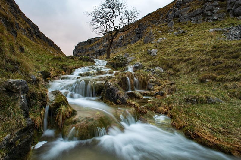 Gordale Scar is a limestone ravine that boasts an impressive, deep gorge that has been formed over millions of years. With two waterfalls and 330ft high limestone cliffs, this is a must for climbers across Yorkshire and the country.