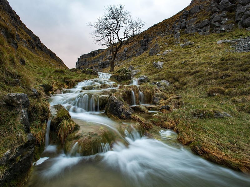 Gordale Scar is a limestone ravine that boasts an impressive, deep gorge that has been formed over millions of years. With two waterfalls and 330ft high limestone cliffs, this is a must for climbers across Yorkshire and the country.