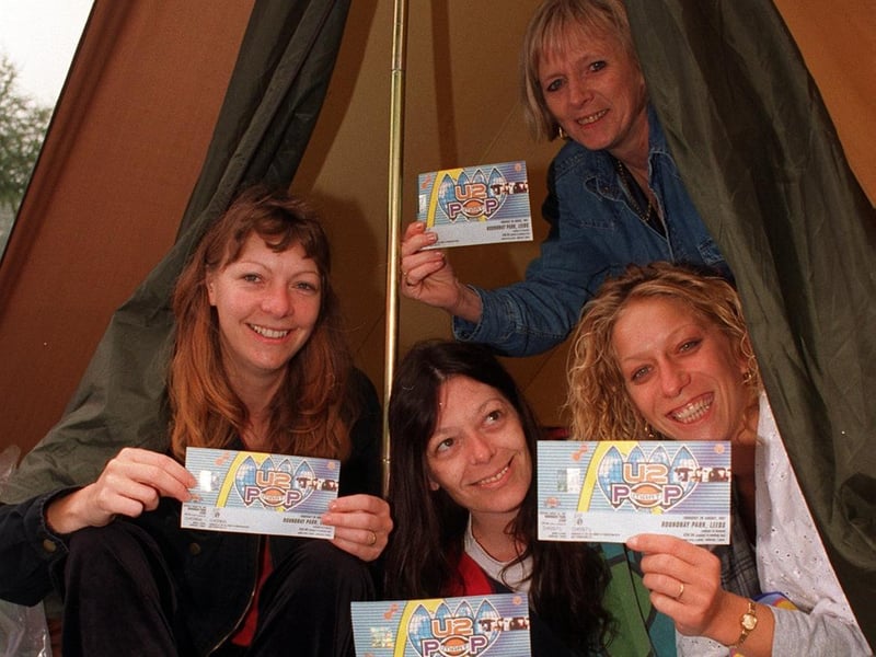 U2 fans show off their tickets at the concert campsite. Pictured, from left, are Jane Johnson, Julie Makin, Rosie Hatfield and Donna Pidd.