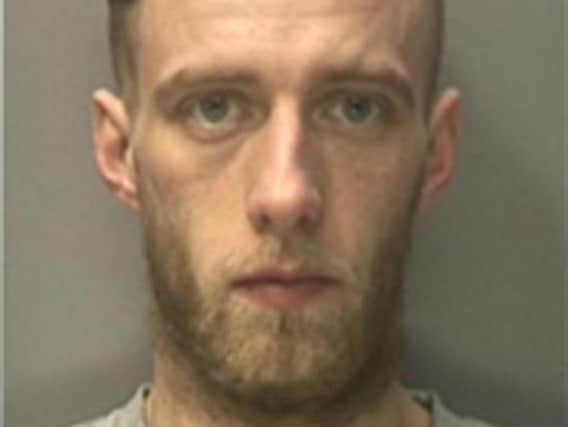 Stephen O'Neil (pictured) was wanted in connection with an allegation of rape, assault and criminal damage. (Credit: Lancashire Police)