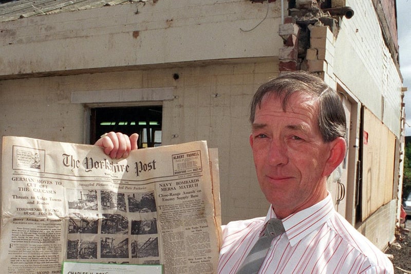 This is John Foster works manager at Optare on Austhorpe Road, holding a time capsule dated 1942. Its contents were discovered in the wall of a building that contractors were knocking down.