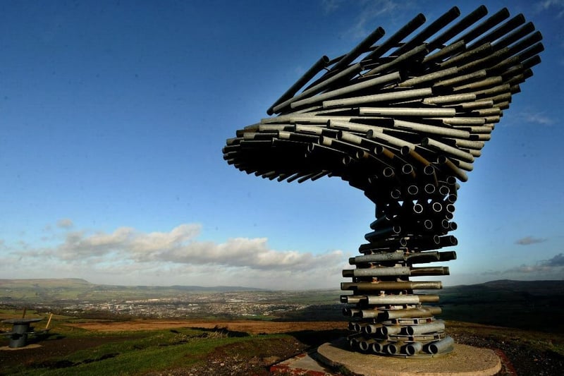 The Singing Ringing Tree is a wind powered sound sculpture resembling a tree set in the landscape of the Pennine hill range overlooking Burnley