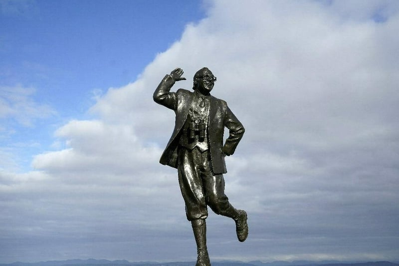 Unveiled by the Queen in 1999, the slightly larger than life-sized statue depicts Eric Morecambe in one of his characteristic poses with a pair of binoculars around his neck (he was a keen ornithologist).